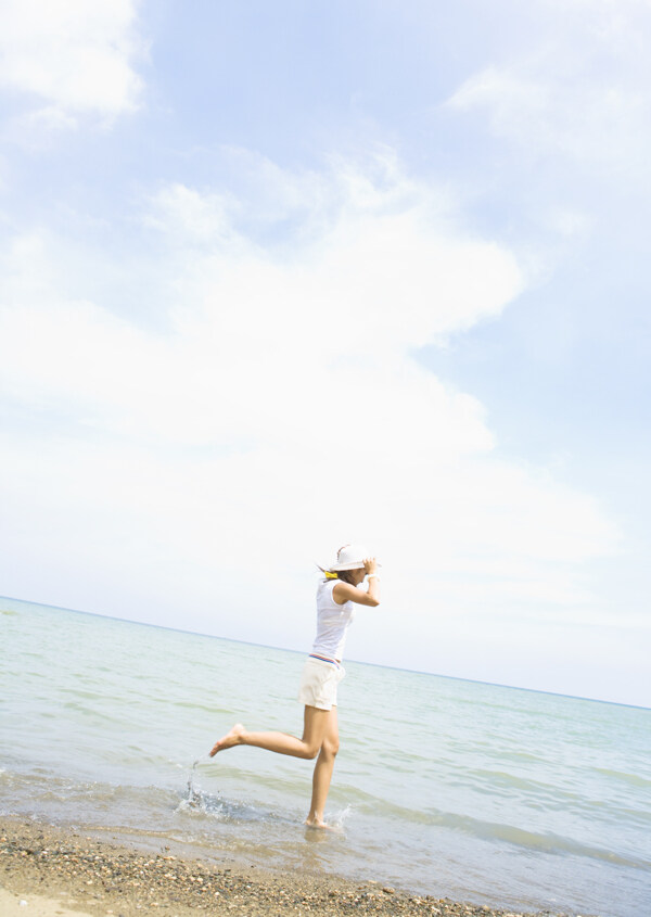 女性與海灘圖片