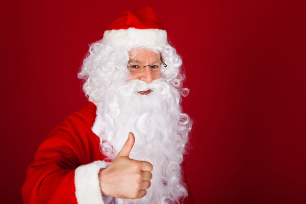 竖起大拇指的圣诞老人图片