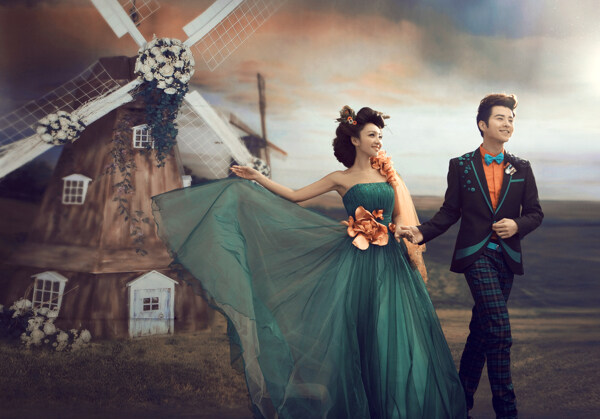 风车与新人夫妻婚纱照图片